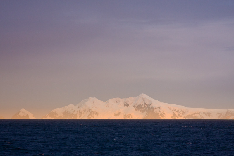 Snow Covered Peak At Sunset